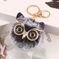 Adorable owl pom-pom keychain featuring gold glasses and fluffy grey faux fur - Owl Style (2-10) / Black and White Frost