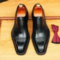 Elegant black leather business shoes with square toe and brogue pattern detailing. - 38 / Blue Border / Black