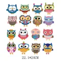 Detailed view of 16 cartoon owl heat transfer designs on a 22.1x24cm sheet for textiles - 16 Owl Styles (DH051) / 16 Pcs