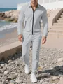 Full view of men's grey textured tracksuit set in an outdoor beach setting - S / Top And Bottom / Gray