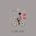 Floral girl on bicycle heat transfer sticker for clothing, 5.2x5.5cm size - Floral Girl Riding with Heart Balloon (AT0421) / 5.2*5.5CM
