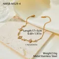 Detail of gold plated stainless steel star bracelet with pink zircons and size specs - Pentagram Chain Style (NMSB-M329-4)