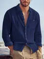 Detailed view of navy blue men's loose linen shirt with texture and pocket - Navy Blue