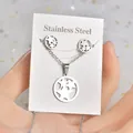 Silver stainless steel star pendant necklace and stud earrings jewelry set on display - Triple Star Circle Set (TT-184) / Silver