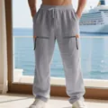 Vue détaillée du pantalon en lin gris ample avec fermetures éclair et taille à cordon. - Gris