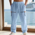 Détail du pantalon en lin bleu clair avec des accents de fermeture éclair stylés - Bleu clair