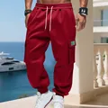 Macro detail of red men's heavy fleece cargo sweatpants featuring multi-pocket design - S / Bottoms / Red