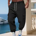 Detailed view of men's black fleece-lined cargo pants with pockets and drawstring. - Black