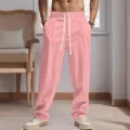 Detail view of men's pink linen straight-leg pants featuring a drawstring elastic waist - S / Bottoms / Pink