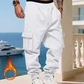 Detail shot of men's white heavyweight fleece-lined cargo sweatpants in a loose fit - White