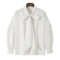 Stylish white long-sleeve shirt featuring drop shoulder and loose tie neck design - S / Tops / Off White
