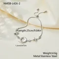 Detailed view of an adjustable stainless steel bracelet with moon and star charms - Silver Star Moon Style (NMSB-L426-2) / 18K Gold