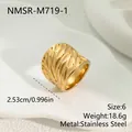Close-up of gold stainless steel wide ring with intricate hollow leaf pattern details - Hollow Out Leaf Style (NMSR-M719-1) / Size 6 / Gold