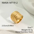 Close-up detail of a wide gold stainless steel ring with hollow leaf pattern texture - Hollow Out Leaf Style (NMSR-M719-2) / Size 7 / Gold