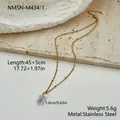 Detailed view of purple amethyst pendant on a gold stainless steel beaded chain necklace. - Amethyst Raw Stone Style (NMSN-M434-1)