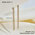 Detailed close-up view of long stainless steel tassel earrings with sparkling full zircon stones - Long Tassel Style (NMSE-M331-2)