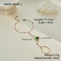 Pulsera de mano de acero inoxidable dorado con corazón de circón verde, detalle - Pulsera de Anillo de Corazón de Diamante Verde (NMSR-M344-2) / Chapado en oro 18K