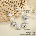 Detailed view of a baroque pearl and stainless steel disk bracelet with size specifications - Metal Disc Style (NMSB-M321-4)