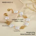 Detailed macro view of gold flower and baroque pearl bracelet with measurements. - Daisy Flower Style (NMSB-M323-2)