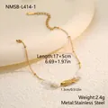 Detail view of a stainless steel fish charm bracelet with white beads and measurements. - Goldfish White Bead Charm (NMSB-L414-1) / 18K Gold