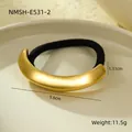 Close-up detail of golden curved stainless steel hair tie with size and weight specs - Gold Matte Curved Style (NMSH-E531-2)