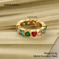 Macro detail of gold stainless steel ring featuring colorful heart gemstones and width - Gold Heart Shape Style (NMSR-M445-1)