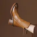 Vintage brown leather ankle boots featuring chunky high heels and side zipper with tassel - Brown