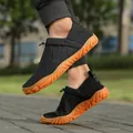 Breathable fly-knit men's hiking sneakers with non-slip soft orange sole in black - 39 / Black