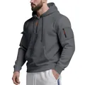 Detailansicht eines grauen Fleece-Hoodies mit markanten orangefarbenen Reißverschlüssen. - Dunkelgrau