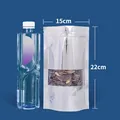 Silver aluminum foil stand-up pouch with clear window for food storage, size 15x22cm - 100 Pieces/Pack (15x22+4cm)