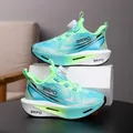 Vibrant aqua green boys' sports shoes featuring a convenient rotation buckle system - Fluorescent Green