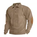 Close-up of men's retro corduroy polo shirt with elbow patches and textured fabric detail - S / Tops / Brown