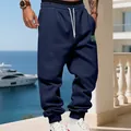Men's navy blue fleece-lined joggers featuring a drawstring waist and cuffed ankles - S / Bottoms / Navy Blue