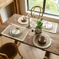 Rustic burlap placemats with fringe in rectangular and round shapes on wooden table - White Fringe