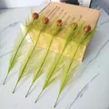 Detalle de ramas de Navidad artificiales verdes con bolas de espuma roja brillantes - Juego de 5 / Verde