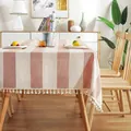 Elegant striped linen tablecloth with decorative tassels in a modern dining room - 100*140cm / Pink