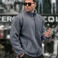 Close-up detail of a men's grey fuzzy sherpa jacket featuring a stand collar and full zipper - S / Tops / Gray