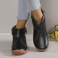 Black round-toe leather ankle boots with stylish contrast stitching and fold-over cuff - 35 / Black
