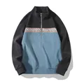 Herren-Freizeit-Sweatshirt mit halbem Reißverschluss und geometrischem Muster in Blau. - M / Oberteile / Schwarz Patchwork Blau