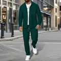 Detailed view of men's dark green waffle knit zip-up jacket and trousers set on street - S / Top And Bottom / Dark Green