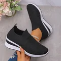 Stylish black fly-knit women's sneakers featuring sparkling rhinestones and platform soles. - 36 / Black