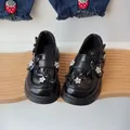 Mocassini neri per bambine con fiori di strass e decorazioni a fiocco, stile elegante - Nero