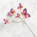 Detailansicht eines naturgetreuen Schmetterlingszweigs mit 5 Köpfen für Blumengestecke und Deko - Butterfly Cluster / Fuchsia