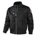 Black tactical bomber flight jacket with US flag patch and multi-pocket design. - S / Tops / Black