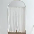 Detailed view of white polka dot door curtain fabric partition with tassels - Daisy Double Opening / 85x90cm / Off White