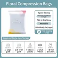 Vacuum storage bag for clothes and quilts with illustrated size and capacity chart - 70x50cm / Flower