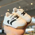Comfortabele loopschoenen met zachte zool in wit en zwart voor jongens en meisjes - Zwart