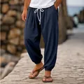 Detail of men's navy cotton linen joggers with drawstring waist and elastic cuffs. - Dark Blue