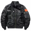 Black MA-1 flight jacket with multi-pocket tactical design and orange velcro arm patch - S / Tops / Black