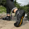 Breathable black hiking sneakers featuring a non-slip yellow lugged sole for trekking - 38 / Black